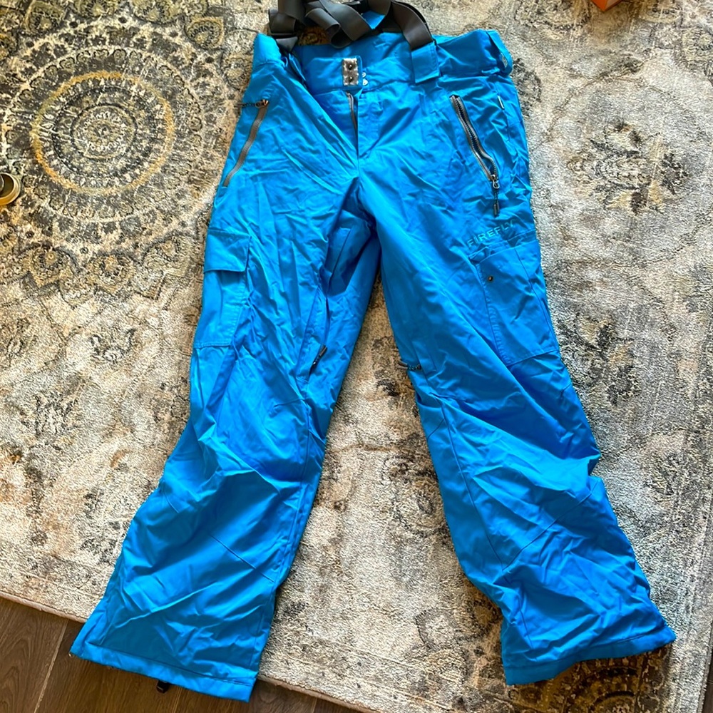 Blue FireFly ski/snowboard pants, size medium. Never before worn.